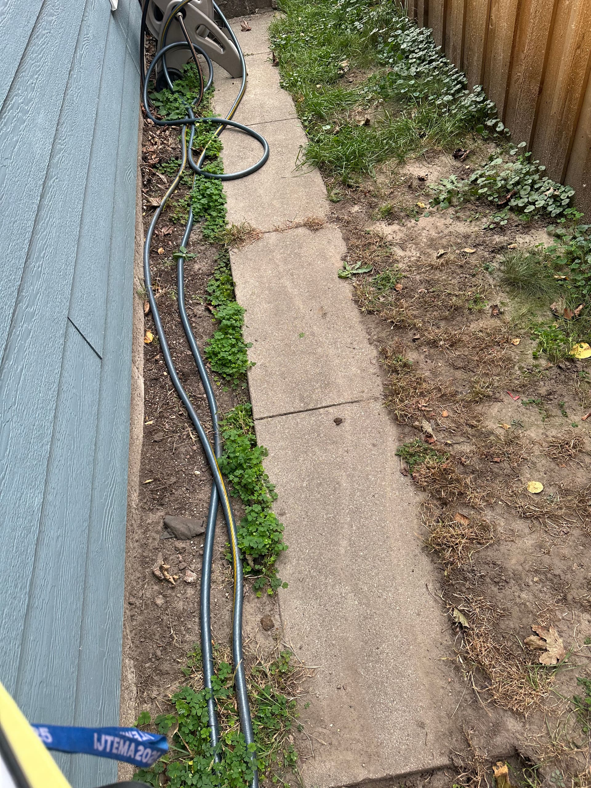 Gallery photos for Transforming a Weedy Side Yard into a Beautiful Stone Pathway: Image #1