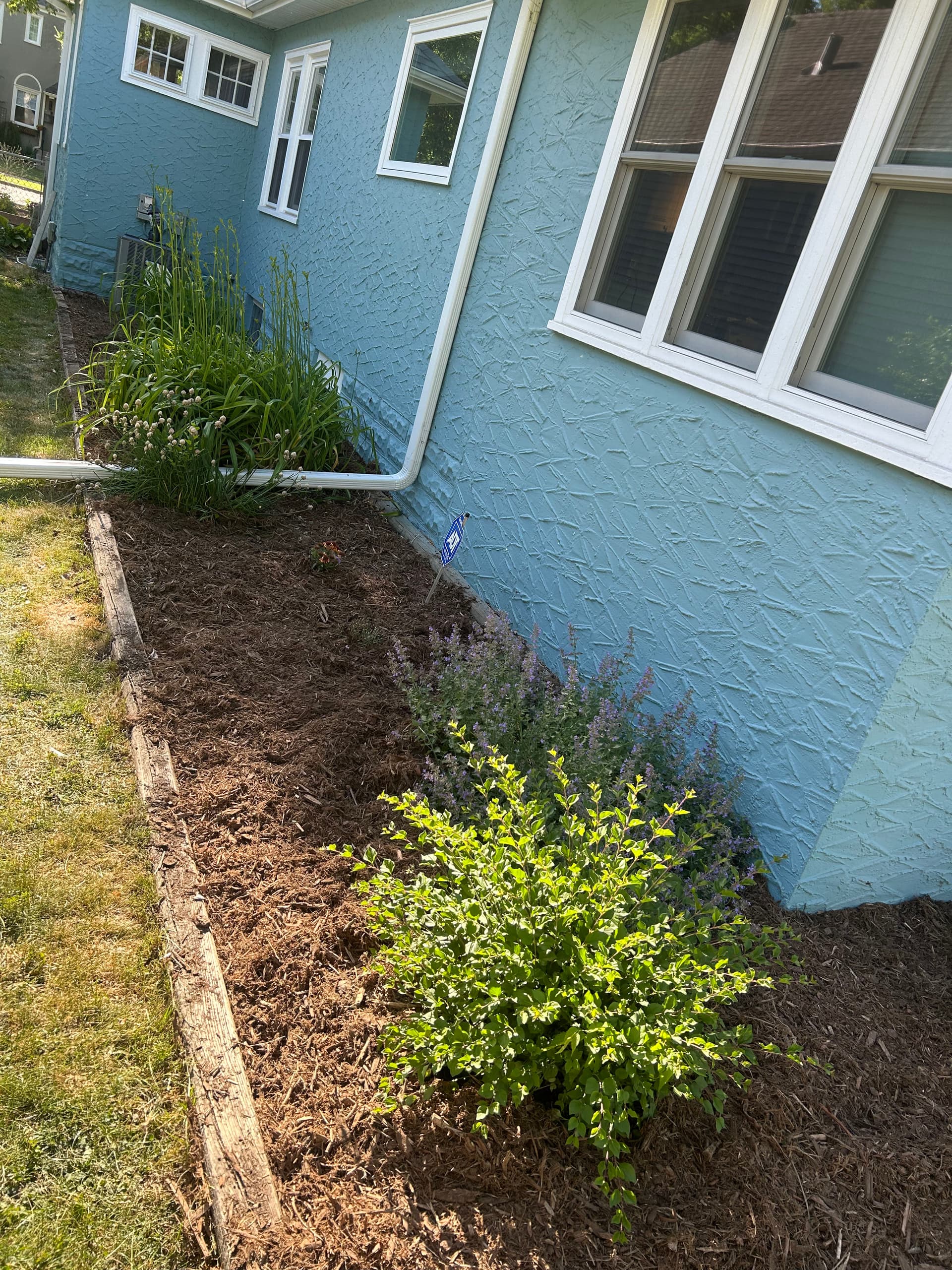 Fresh Mulch and Clean Beds Around the Whole House image