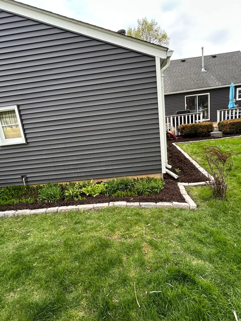 Full-Property Mulching and Bed Edging Done Right in Minneapolis image
